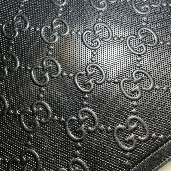 G*u*i gg embossed pouch