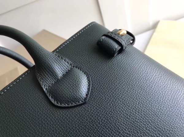 B**rry the medium banner in leather and house check