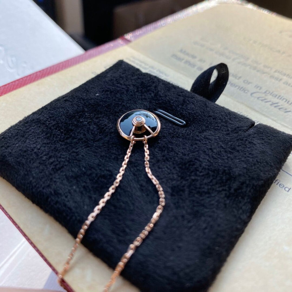 Ca*t*er  amulet necklace