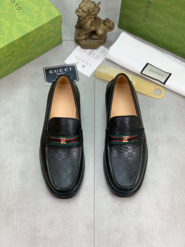G*u*i loafers