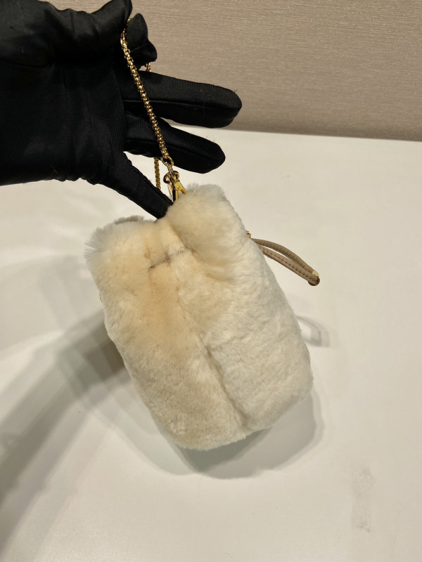 Pra*a shearling bucket bag