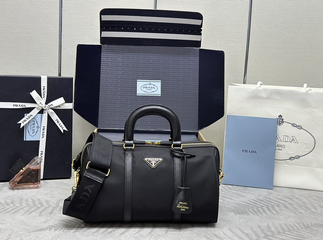 Pra*a re-nylon and saffiano leather top-handle bag