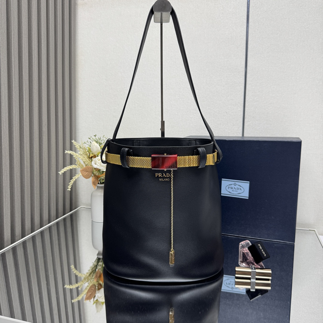 Pra*a buckle leather bucket bag with jeweled belt